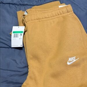 Nike Men's Mustard Joggers with White Swoosh